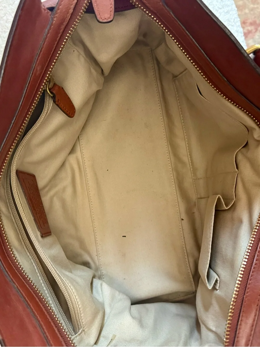 Structured Brown Leather Tote Handbag with Tassel Accent
